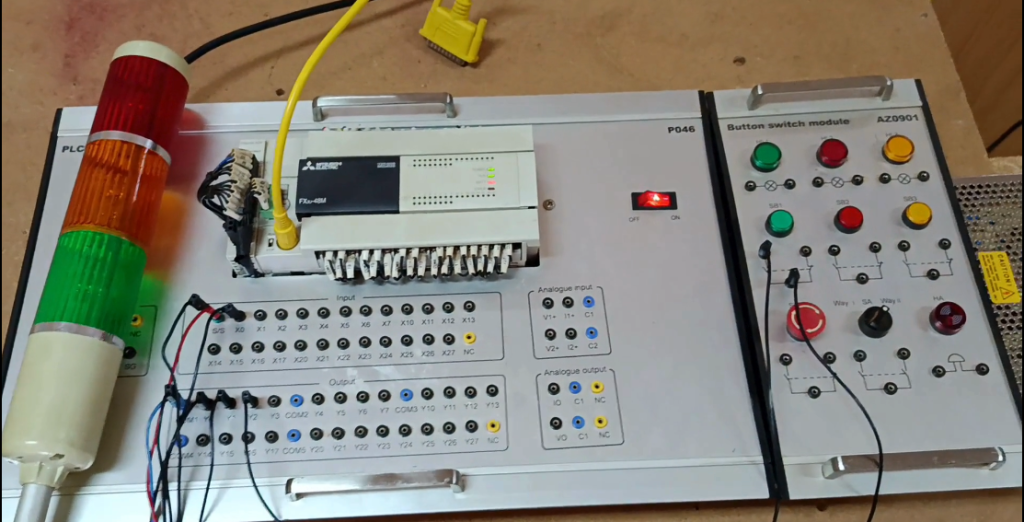 This is a full build-along tutorial featured image that goes beyond the Bob Teaches Tech YouTube video. It covers the hardware, wiring, GX Works2 project setup, and explains each step of an automatic timer loop sequence on a Mitsubishi FX3U PLC