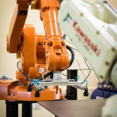 An automated production line integrating physical machinery with digital monitoring for enhanced efficiency